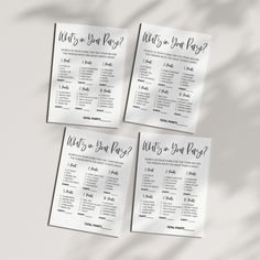 four wedding seating cards with black ink on white paper, which reads what do you pay for?