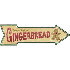 a wooden sign that says fresh baked gingerbread with a teddy bear on the front