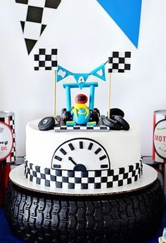 a birthday cake with a race car on top