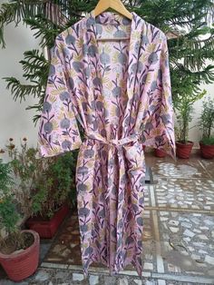 This Robe we makes from 100% Cotton printed fabric. The fabric print is Anokhi Floral which is very popular in all over the world . We use pure cotton cambric fabric . This is free One size robe . There is both side pocket in robe. Length = 120 cms. ( 48 inches) Multicolor Cotton Bedtime Dress, Pink Floral Print Cotton Nightgown, Multicolor Cotton Home Robe, Printed Cotton Robe For Home, Printed Cotton Lounge Dress, Long Sleeve Cotton Robe With Floral Print, Multicolor Cotton Robe With Floral Print, Pink Cotton Sleep Robe, Fitted Multicolor Cotton Sleepwear