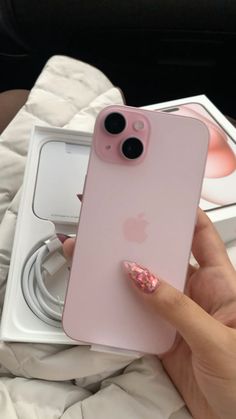 a person holding an iphone in their hand with the case on it's side