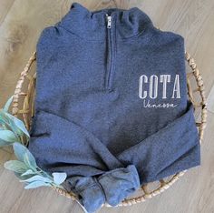 This cute occupational therapy assistant quarter zip sweatshirt is perfect for any therapist and makes a great staple for your own wardrobe. quarter zip sweatshirt is the perfect OTA or COTA graduation gift. It can be customized for any occupational therapy graduation gifting needs or simply add this to your own wardrobe!  *Unisex sizing. No pockets. 1/4 Zip. Embroidery is on left chest, unless requested otherwise.  To order: 1.  Shirt Color 2. Shirt Size In personalization box: 1. Enter credent Occupational Therapy Gifts, Chiropractor Gifts, Occupational Therapy Assistant, Occupational Therapy Shirts, Slp Shirts, Mother Baby Nurse, Therapy Gift, Nurse Appreciation Gifts, Embroidery Sweater