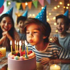 a child blowing out candles on a birthday cake