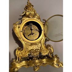 Beautiful table / mantle clock. Made in France in the 19th century . Beautiful ormolu bronze that is cleaned. The clock stands on a beautiful decorated console which is attached to the clock. Beautifully fully decorated with typical French Louis XV decorations .  The movement is recently cleaned and checked by a professional clockmaker. It is in working order. It comes complete with pendulum, winding key and bell. The movement is stamped : Japy Freres et Cie Medaille d'honneur. This stamp was us Antique Mantel Clocks Fireplace, Cogsworth Clock, Retro Objects, Antique Shelf Clock, French Antique Clocks, Wall Clocks From The 1900s, Pendulum Clock, Mantle Clock, Antique Clocks