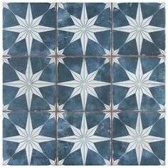 a blue and white tile with stars on it