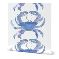 a blue and white crab tile on a wall