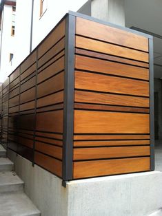 the side of a building with wooden slats on it