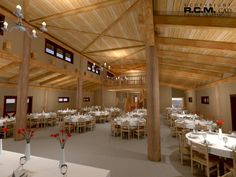 the inside of a restaurant with tables and chairs