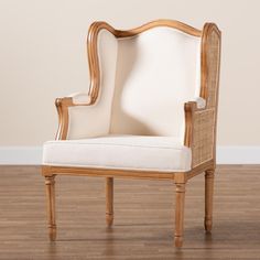 a white chair sitting on top of a hard wood floor