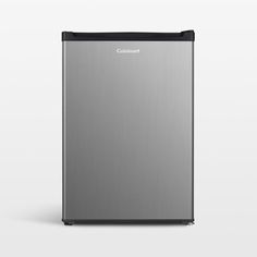 a stainless steel refrigerator sitting on top of a white floor next to a black cabinet