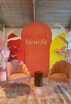 two chairs sitting in front of a sign that says beyond benefit