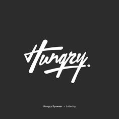 the word hungry written in white ink on a black background with an image of a handwritten