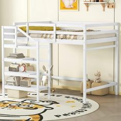 a white bunk bed sitting on top of a rug next to a desk and bookshelf