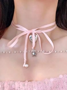 𝔇𝔢𝔱𝔞𝔦𝔩𝔰: Style: Coquette, Kawaii, Egirl Materials: Ribbon & Metal Quantity: 1 pc (As shown) This is a cottage core ribbon choker that features the lace up style & cute star & pearl beads pendants Solid quality with durable material. Adjustable to your neck size Enjoy free shipping with a purchase of over 80$ Summer Pink Choker As Gift, Cute Pink Choker For Party, Cute Pink Necklaces For Spring, Cute Pink Necklace For Spring, Cute Summer Party Necklaces, Cute Party Necklaces For Summer, Cute Adjustable Heart Choker, Adjustable Cute Pink Choker, Cute Adjustable Heart Shaped Choker