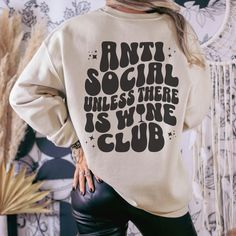 This sweatshirt is perfect for those who are anti-social until the wine is flowing. Perfect for a wine tasting trip to Napa or Italy ️. Great gift for that special person who loves vino, and might not be the biggest social butterfly....we all now one! Check out all our trendy apparel & gift items at https://bellawarriorboutique.etsy.com **Enjoy FREE SHIPPING ON ORDERS OF $35 OR MORE as our thank you for purchasing from Bella Warrior Boutique. Thank you, thank you, THANK YOU ‼️Production and ship Drinks Outfits, Wine Club, Funny Wine, Warrior Spirit, Club Sweatshirts, Social Butterfly, Wine Humor, Wine Clubs, Wine Lover