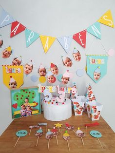 a birthday cake and party decorations on a table