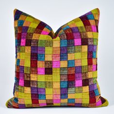 a multicolored pillow on a white background