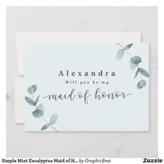 a white card with blue leaves and the words, kristiana will you be my matron of honor