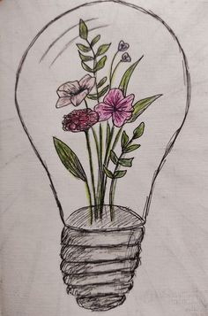 a drawing of flowers in a light bulb