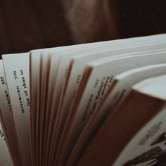 an open book sitting on top of a table