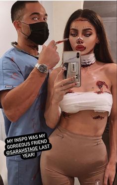 a man taking a picture of a woman with her face painted like a nurse and the caption reads, my hero was my 6 year