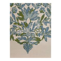 a blue and green floral design on white fabric