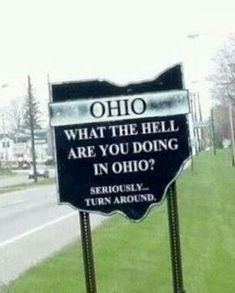 a black and white sign that says, what the hell are you doing in ohio?