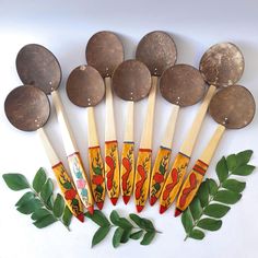 a group of wooden spoons sitting next to each other