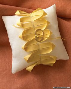 a pillow with a ring on top of it