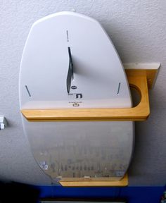 a clock mounted to the side of a wall