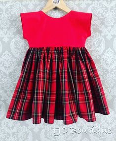 Beautiful block colour bodice with red tartan full skirt. Made from quality 100% cotton. Includes a hair bow accessory to match Classic Cotton Party Dress, Plaid Cotton A-line Dress, Classic Cotton Plaid Dress, Classic Plaid Cotton Dress, Classic Red Cotton Dress, Classic Gingham Cotton Dresses, Pink Fitted Plaid Cotton Dress, Handmade Girls Dress, Twirly Skirt