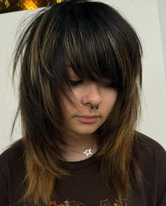 Gorgeous emo shag haircut on brown and blonde hair. Looking for a bold new hairstyle? Check out these 17 emo shag haircuts for inspiration! From choppy layers to asymmetrical bangs, these styles are perfect for all the scene girls out there. Get ready to find your next go-to look and stand out from the crowd with these trendy haircuts! Scene Haircuts Layered, Blonde And Black Emo Hair, Spiky Layered Hair, Emo Hair Women, Cute Emo Haircuts, Shoulder Length Emo Hair, Scene Hair Brown, Emo Haircuts For Women, Layered Emo Hair