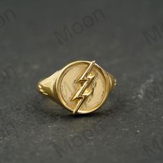 Flash Ring,Sterling Silver Ring,Flash Point Ring,DC Comics,DC Jewelry,14k Gold Ring,Unisex Ring,Stackable Ring,Barry Allen Ring,Cosplay Ring ◈ Item Details ◈ Metal: 925 Sterling Silver  Style: Gemstone Rin ABOUT GEMSTONE - ♥ Purification ♥ Serenity ♥ Protection ♥ Wisdom ♥ Balance ♥ Strength ♥ Friendship ♥ Love ♥ Positive thinking ♥ Sensitivity S I L V E R J E W E L R Y C A R E Silver is not the best friend of oxygen and sulfur; it can be oxidized and tarnished from time to time it is the nature of silver. To keep the silver shiny and prevent it from oxidizing fast, we would recommend the following instructions; * Avoid any chemical agents including perfume, makeup, and hair spray. * Avoid wearing silver jewelry to the beach, shower, or exercise. * Remove before you sleep, clean it with a s Dc Jewelry, Flash Ring, Flash Point, Beach Shower, Barry Allen, Fancy Gifts, Hair Spray, Unisex Ring, Silver Style