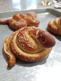 some very cute looking pastries on a pan