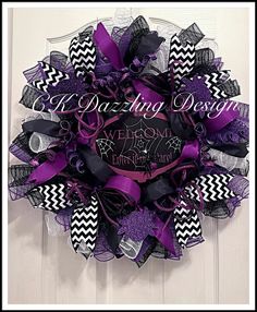 a purple and black mesh wreath with the words i'm dancing design on it