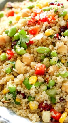 a mixture of vegetables and grains mixed together