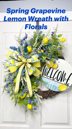 a welcome wreath on the front door with yellow and blue flowers, greenery and eggs