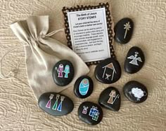 the nativity black stones are on display with a note about their story and instructions