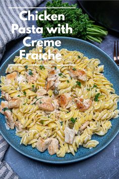 chicken pasta with creme fraiche on a blue plate