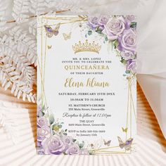 a wedding card with flowers and butterflies on it