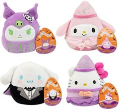 hello kitty plush toys are shown in four different colors