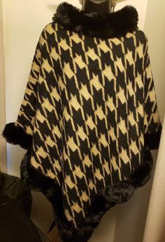 Warm beautiful poncho.  We have different prints and color. Cozy Winter Cape Poncho, Fall Poncho With Faux Fur Trim Cape, Chic One Size Poncho For Winter, Elegant Winter Poncho One Size, Chic Winter Shawl Poncho, Chic Winter Shawl Cape, Fur Poncho, Winter Top, Ladies Poncho