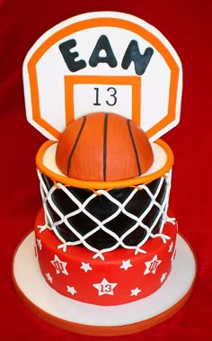 a basketball themed birthday cake on a red background