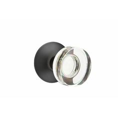 an image of a black and white door knob with a glass insert on the top