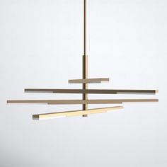 a modern chandelier hanging from the ceiling