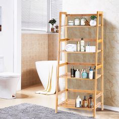 a bathroom with a wooden shelf next to a toilet