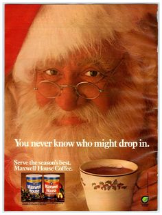 an advertisement for coffee with santa claus holding a cup