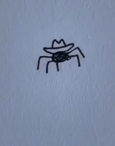 a drawing of a spider with a hat on it's head