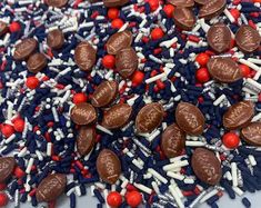 red, white and blue sprinkles with chocolate hearts on them are shown