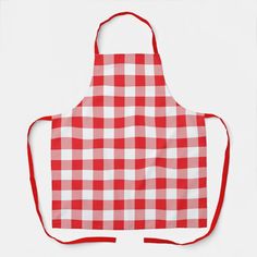 a red and white checkered apron on a white background